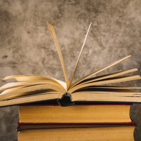 front-view-open-book-top-pile-book